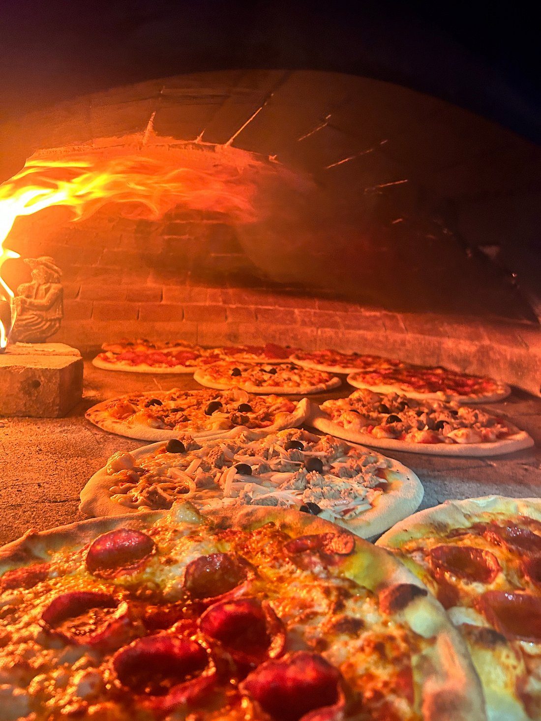 Pizze u krušnoj peći na drva
