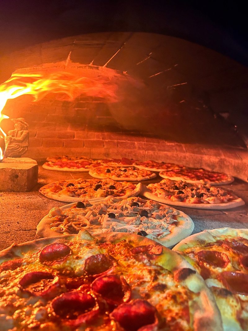 Pizze u plamenu krušne peći